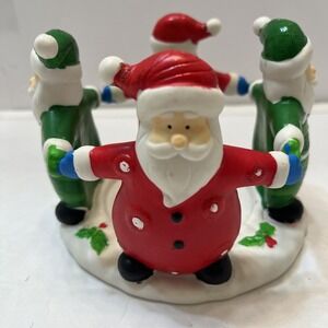 Christmas 4 Santas Ceramic Candle Holder Round Holding Hands Red Green 3.5x5"